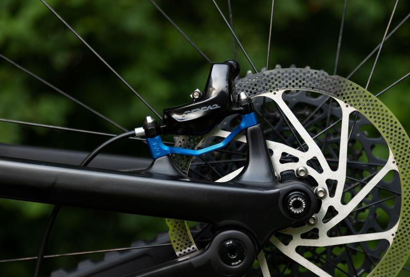 Oak Components Plasmadapt Brake Adapter, Post Mount, +23mm, Blue (incl. Titanium Mounting Hardware)