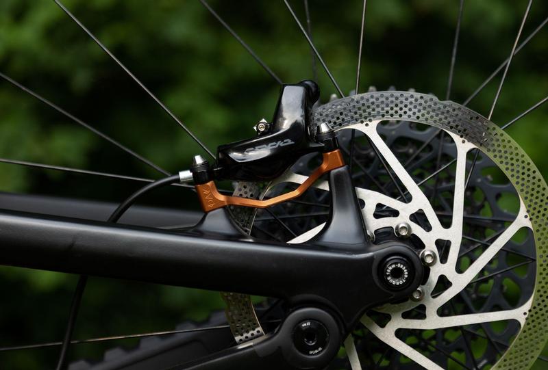 Oak Components Plasmadapt Brake Adapter, Post Mount, +23mm, Kash Gold (incl. Titanium Mounting Hardware)